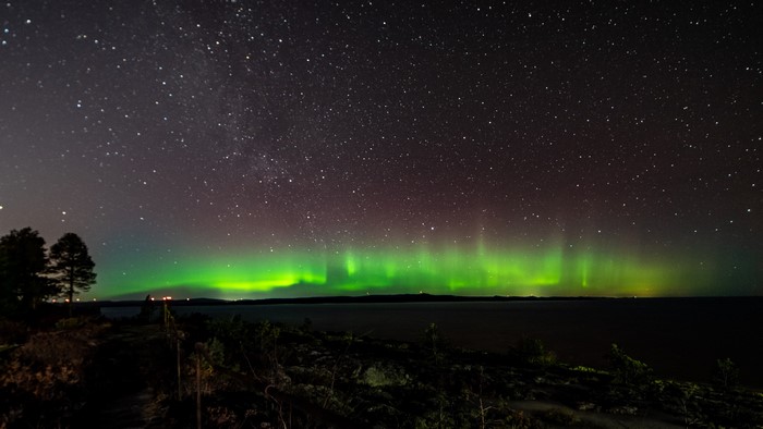 Aurora Borealis over a lake at night