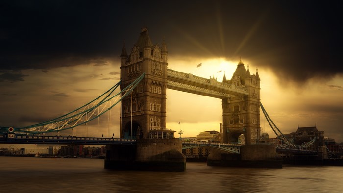 Tower Bridge at sunset over River Thames, London, UK