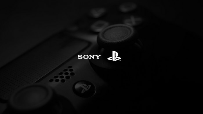 Sony PlayStation controller with logos