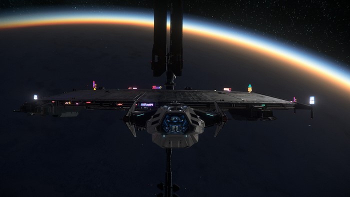 Anvil Carrack spaceship docked at a space station above a planet
