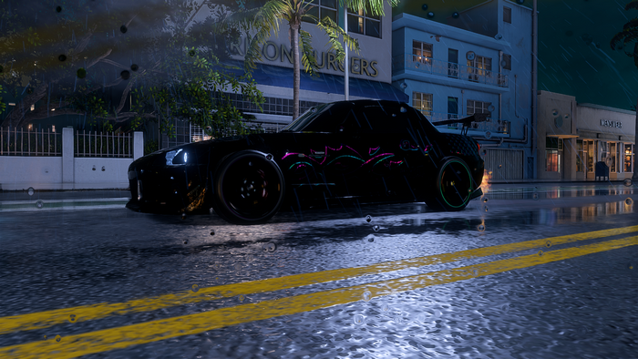 Black Honda S2000 with neon livery in the rain