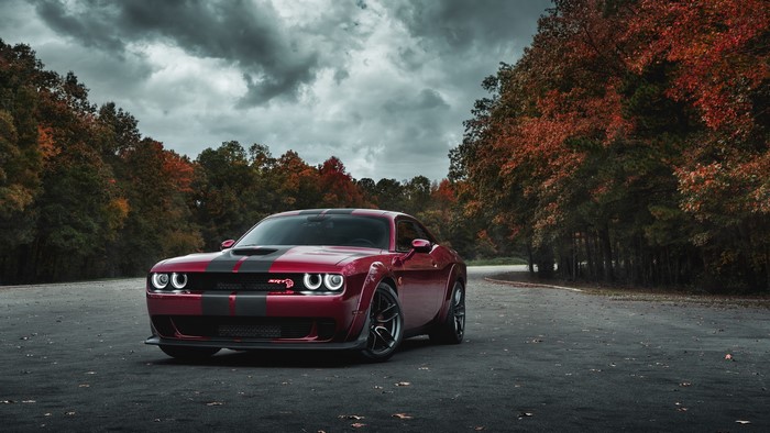 Red Dodge Challenger SRT with Black Stripes in Fall