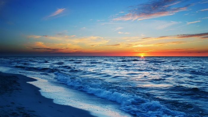 Ocean waves at sunset