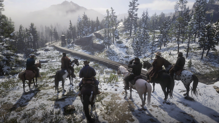 Red Dead Redemption 2 characters on horseback in snowy landscape