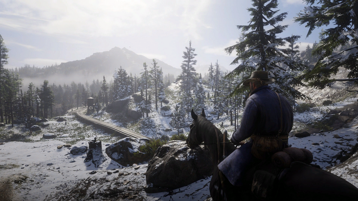 Arthur Morgan from Red Dead Redemption 2 on horseback in winter