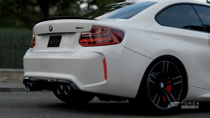White BMW M2 F84 with custom license plate