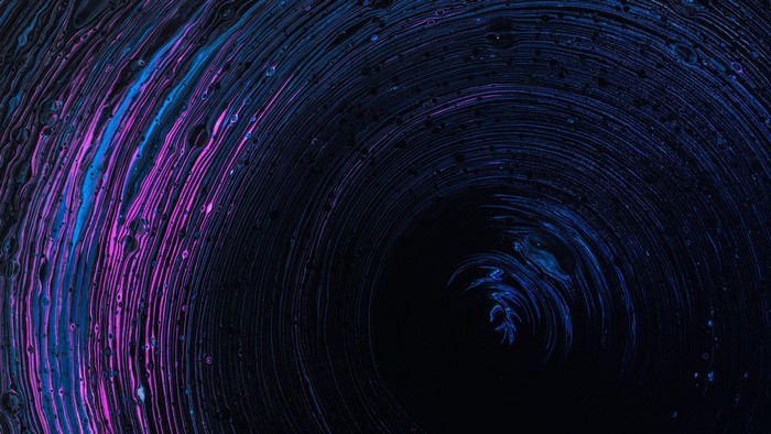 Abstract swirling pattern with pink and blue colors