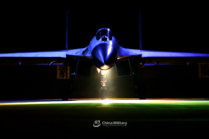 Frontal view of a Chinese military jet fighter on runway