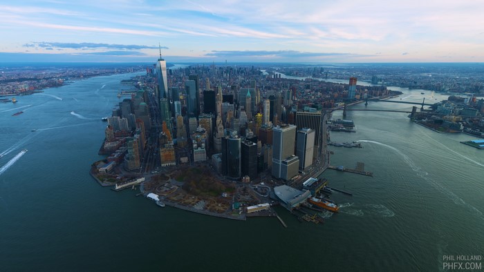 4K New York City cityscape with skyscrapers and river