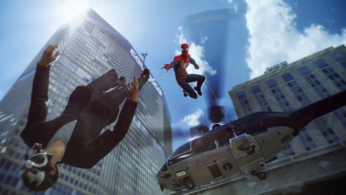 Spider-Man in action with a falling man and helicopter