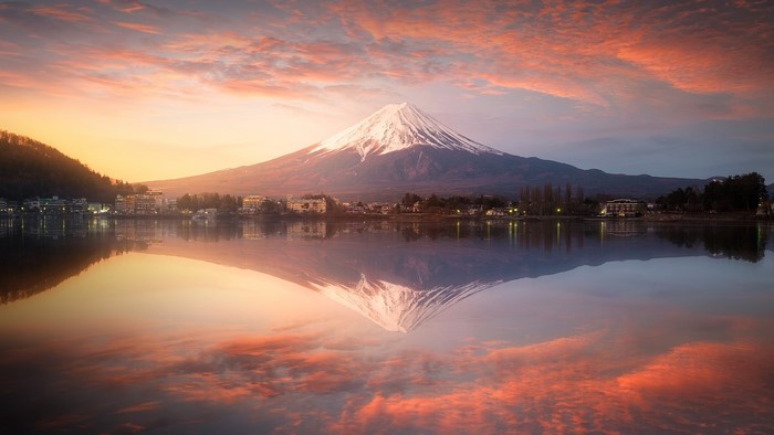 Mount Fuji reflected in Lake Kawaguchi at sunset