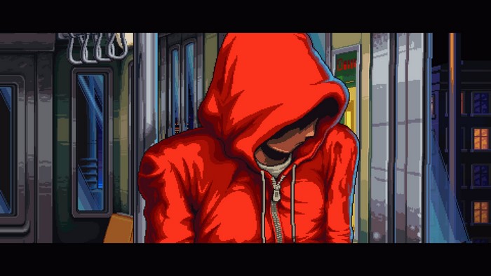 Person in red hoodie on a train at night