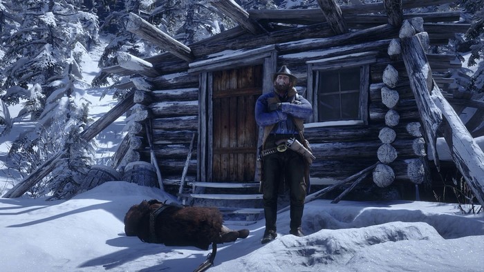 Arthur Morgan from Red Dead Redemption 2 in a snowy cabin