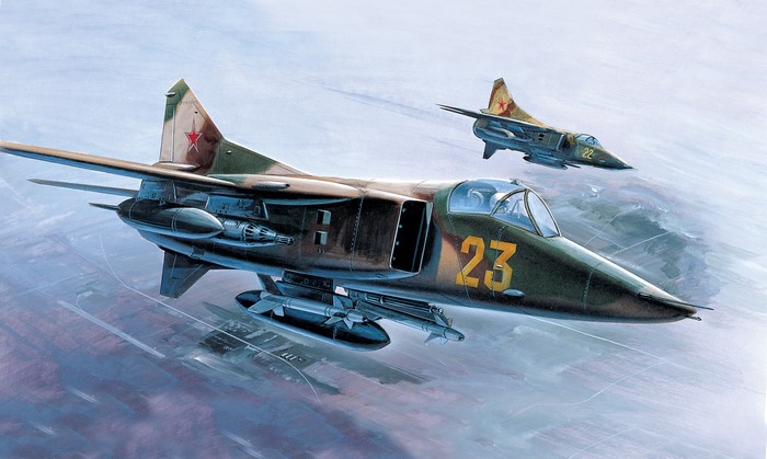 Two MiG-27 fighter jets in flight