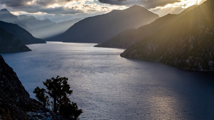 Sun rays over Nahuel Huapi Lake in Patagonia, Argentina