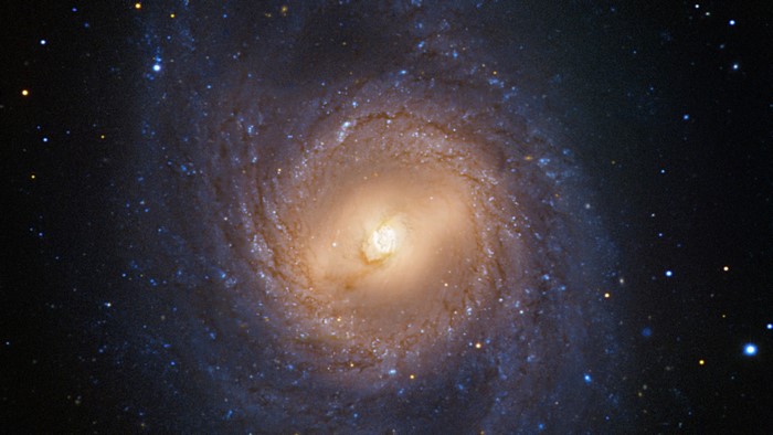 Spiral galaxy with stars in deep space