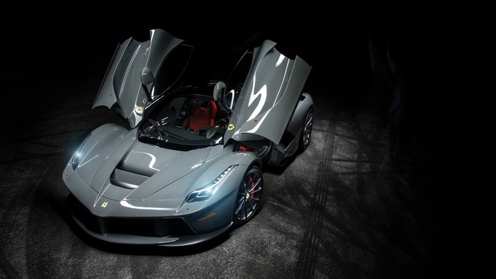 Gray Ferrari with Scissor Doors Open