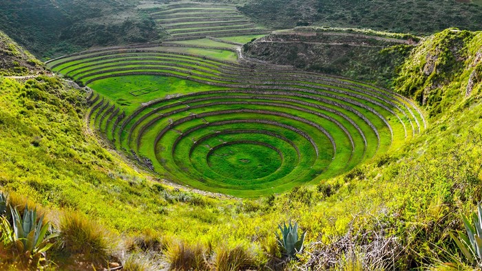 Inca agricultural terraces in a circular valley in Peru