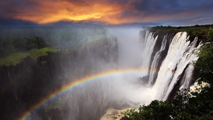Victoria Falls, Zambia at Sunset with Rainbow