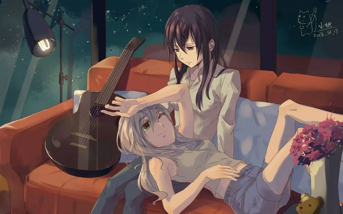 Yuzu and Mei from Citrus on a couch with a guitar
