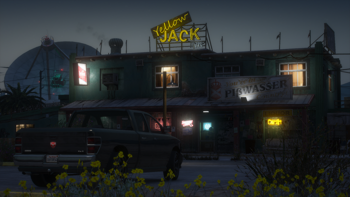 Yellow Jack bar and Pigwasser sign in Los Santos, GTA V