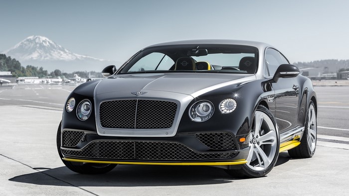 Bentley Continental GT on an airfield with a mountain