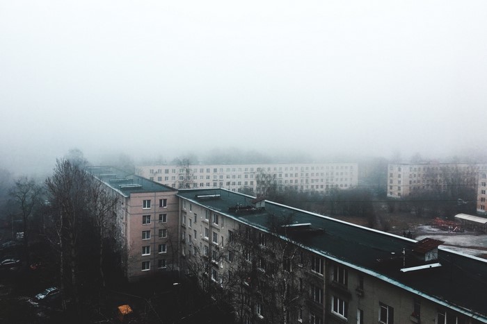 Apartment buildings in the mist