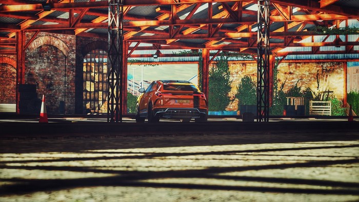 Orange Lamborghini Urus in a Garage