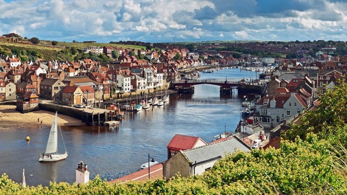Whitby Harbour with a sailboat and bridge