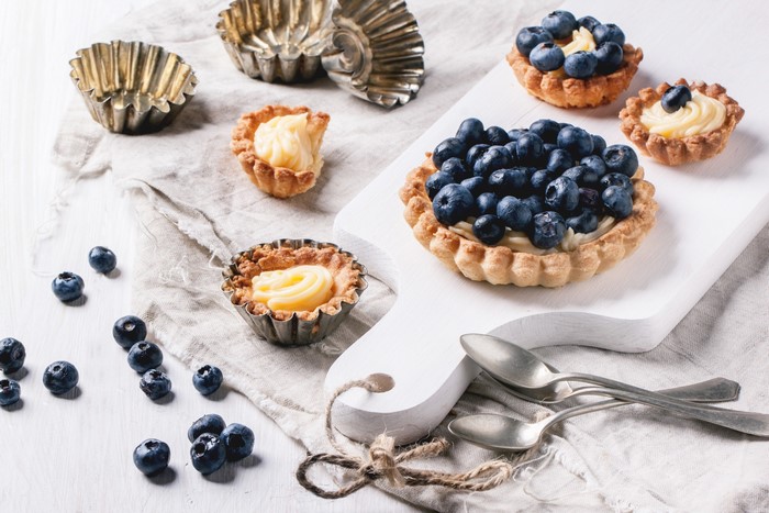 Blueberry tarts with custard and tart molds