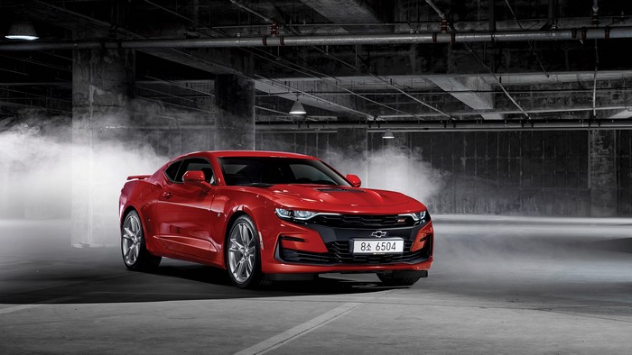 Chevrolet Camaro SS in a smoky garage