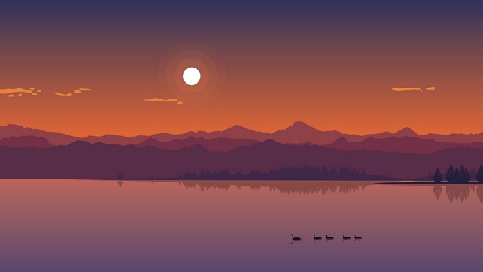 Sunset over mountains and lake with ducks