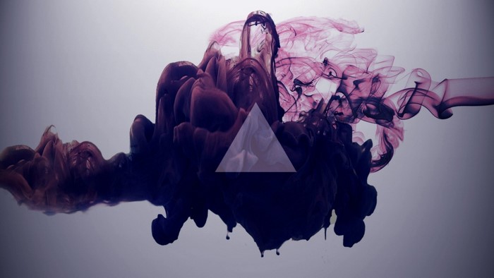 Abstract ink in water with triangle overlay