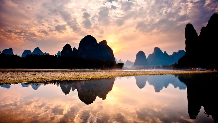 Sunrise over Li River with Karst Mountains in China