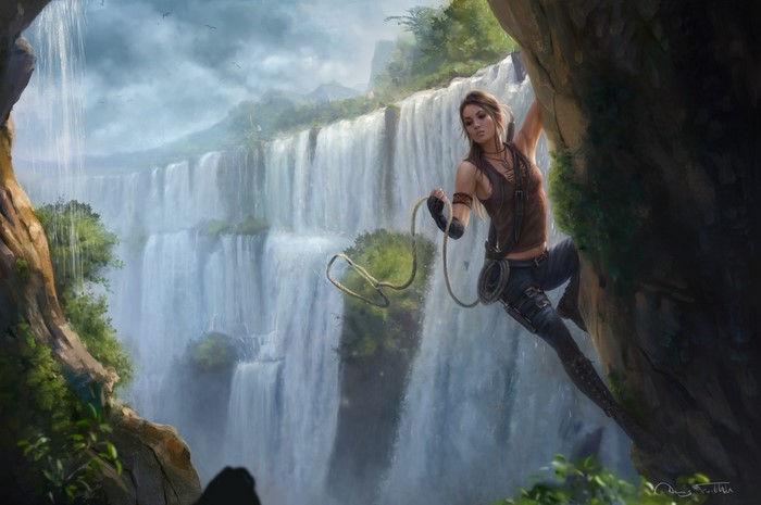 Woman climbing a cliff near a waterfall with a rope