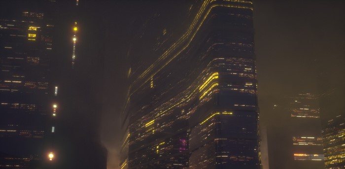 Futuristic city skyline at night with glowing skyscrapers