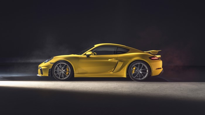 Yellow Porsche 718 Cayman GT4 RS side view