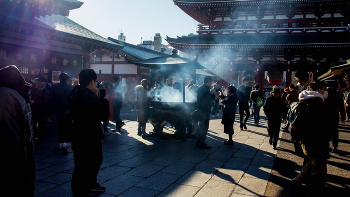 People at Senso-ji Temple in Asakusa with Incense Smoke