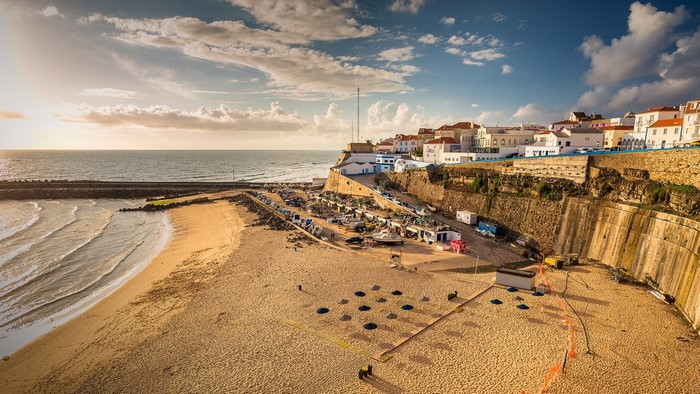 Coastal town with beach and boats in Portugal