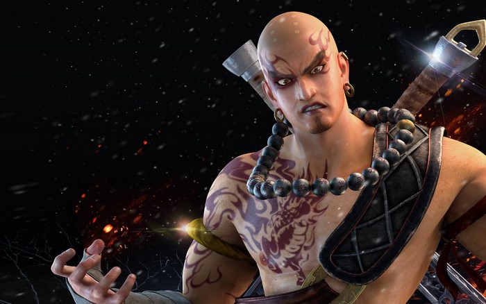 Bald man with tattoos and sword