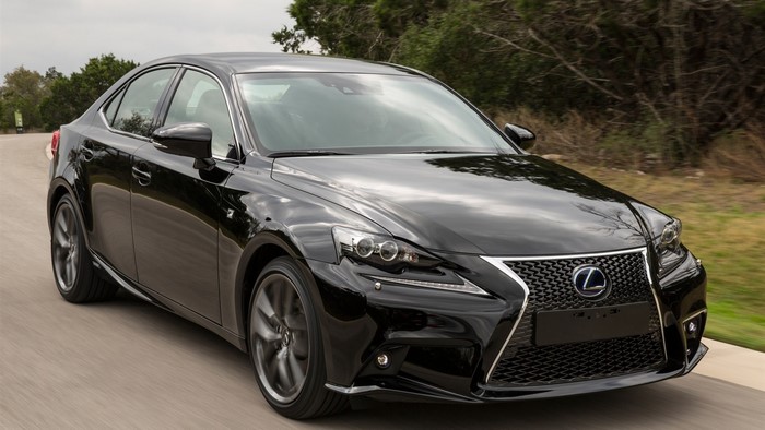 Black Lexus IS Sedan Driving on a Road