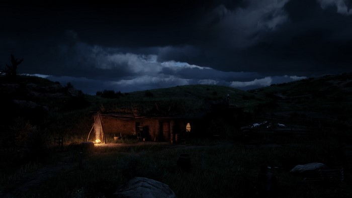 Red Dead Redemption 2 screenshot of a hobbit-like house at night