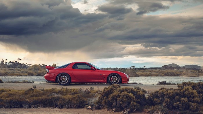Red Mazda RX-7 FD sports car outdoors