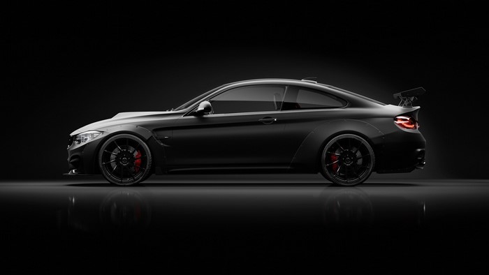 Black BMW 4 Series with bolt-on fender flares