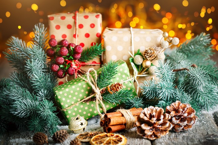 Christmas presents with pine branches and ornaments