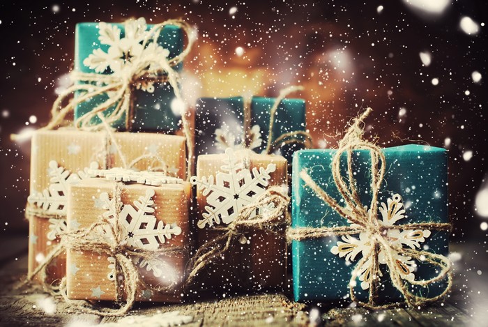 Christmas presents with snowflakes and falling snow