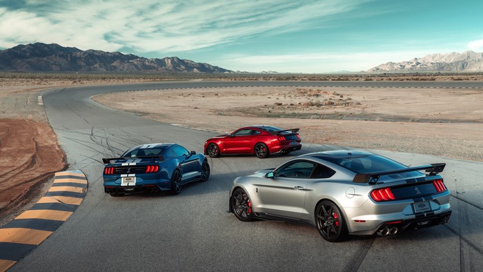 Ford Mustang Shelby GT500 cars on a race track