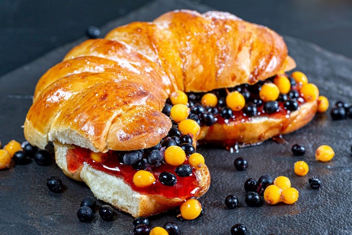 Croissants filled with jam and berries