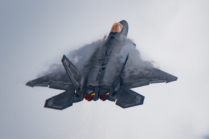 F-22 Raptor aircraft performing a maneuver