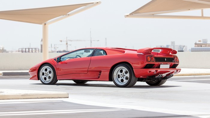 Red Lamborghini Diablo parked outdoors